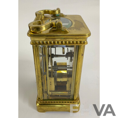 Antique Brass Traveling Clock, Ornate Floral Design with Beveled Glass and Case