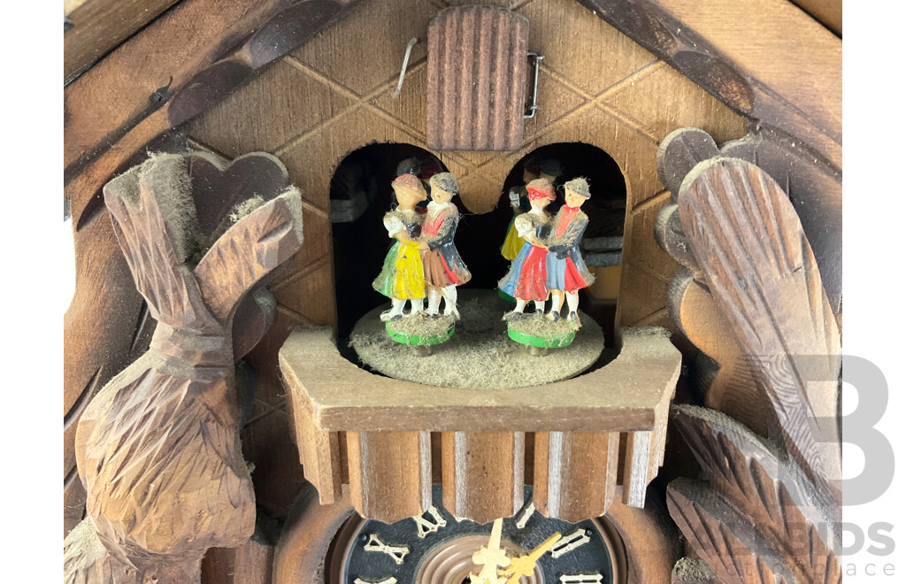 Vintage German Musical Hunters Cuckoo Clock with Carved Rabbit, Bird and Dancing Couples