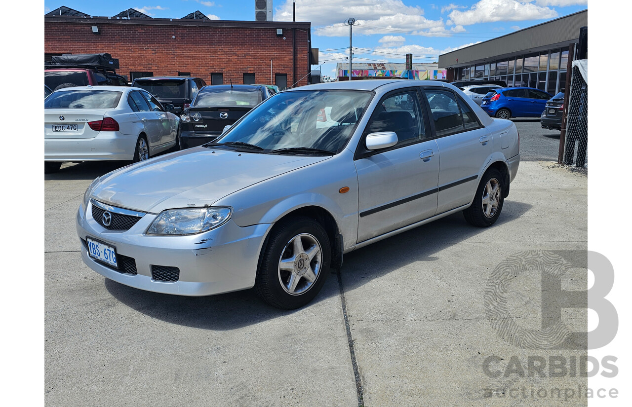 4/2001 Mazda 323 Protege  4d Sedan Silver 1.8L