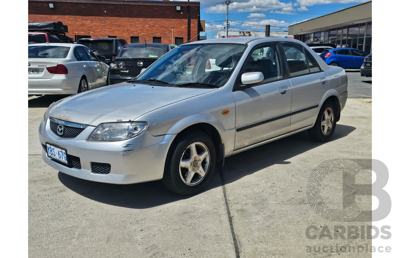 4/2001 Mazda 323 Protege  4d Sedan Silver 1.8L