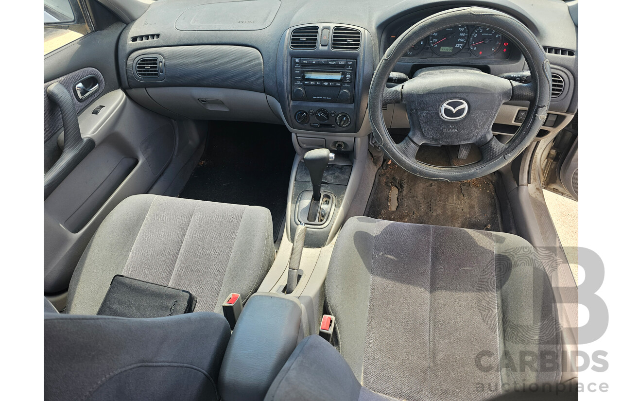 4/2001 Mazda 323 Protege  4d Sedan Silver 1.8L