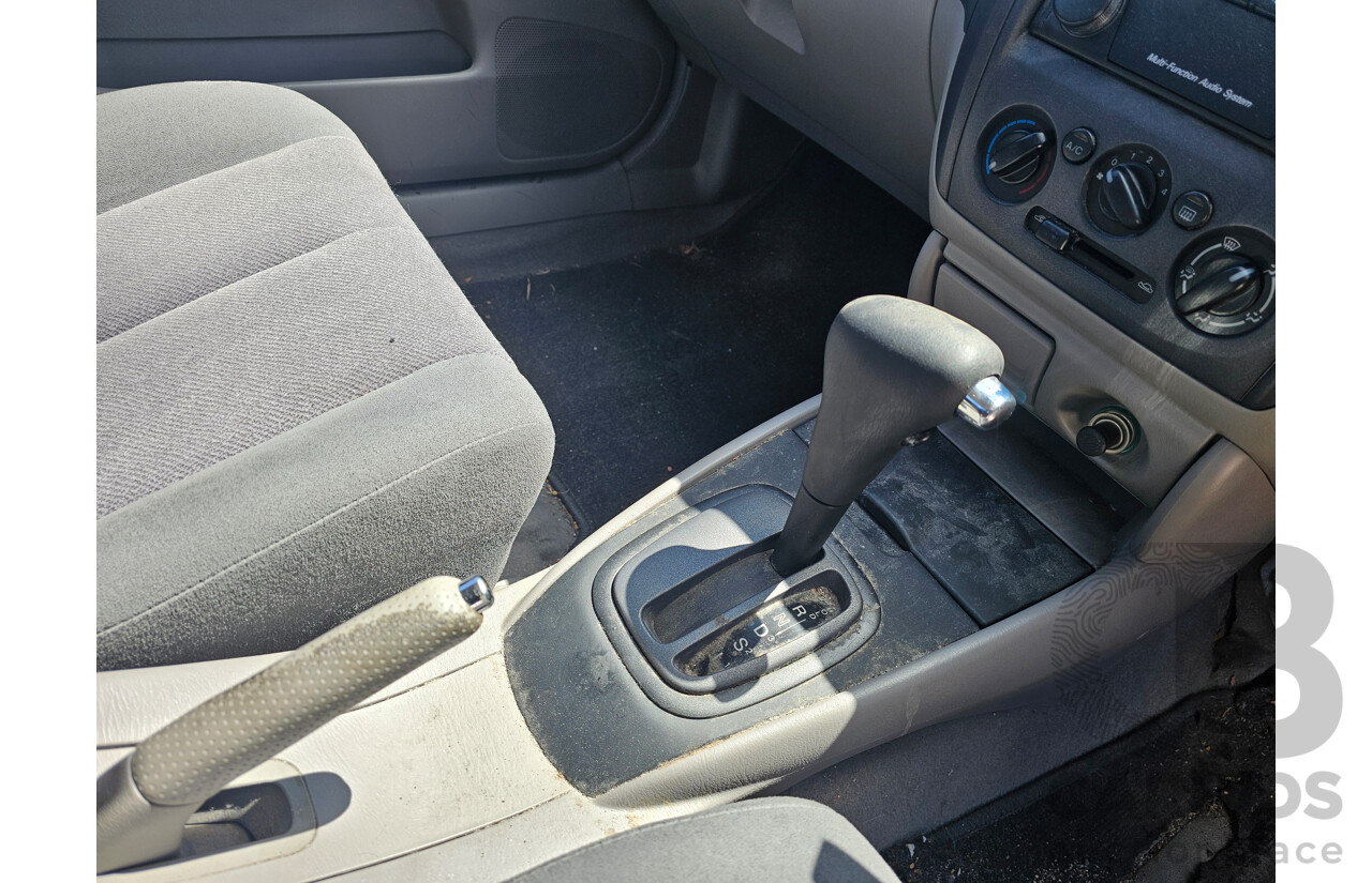 4/2001 Mazda 323 Protege  4d Sedan Silver 1.8L