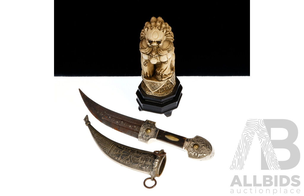 Vintage Arabic Jambiya Dagger with Engraved White Metal Sheath and Handle with Bone Detail Along with Composite Chinese Foo Dog Carving