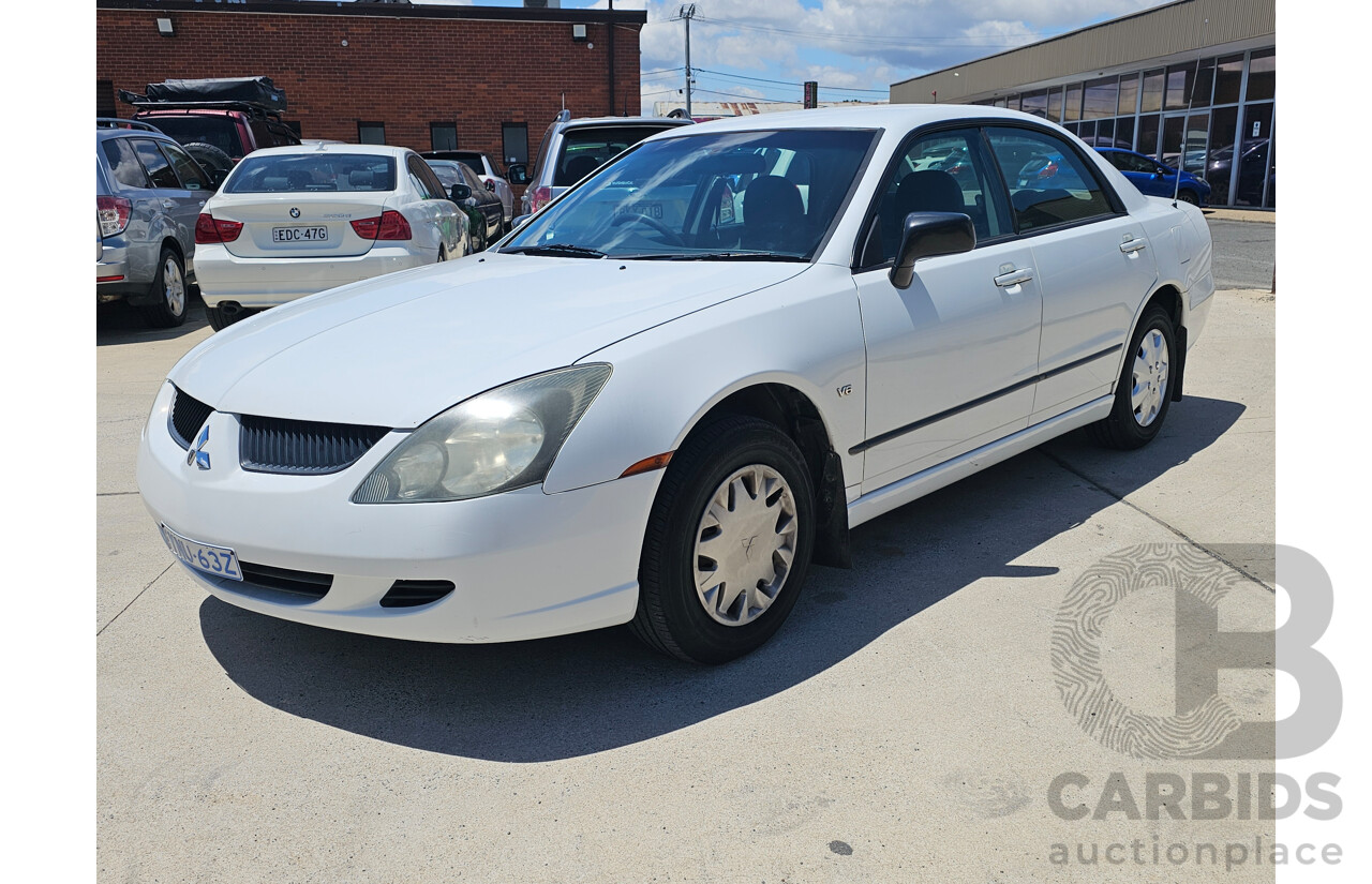 9/2003 Mitsubishi Magna ES TL 4d Sedan White 3.5L