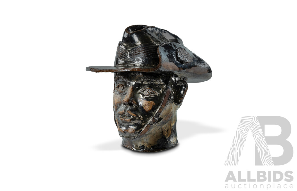 Studio Pottery Bust of a Digger in a Slouch Hat Copper glazed, and interior marked 'D. Selmon 1987'. 