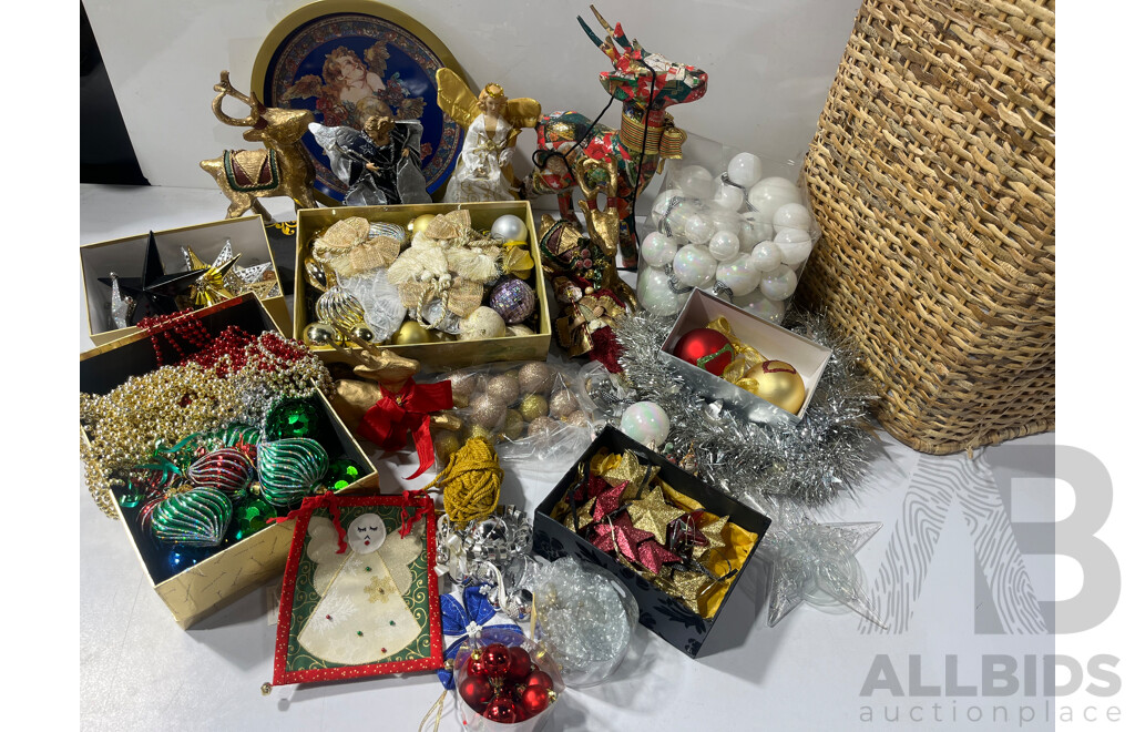 Large Collection Christmass Decorations in Wickerwork Laundry Basket