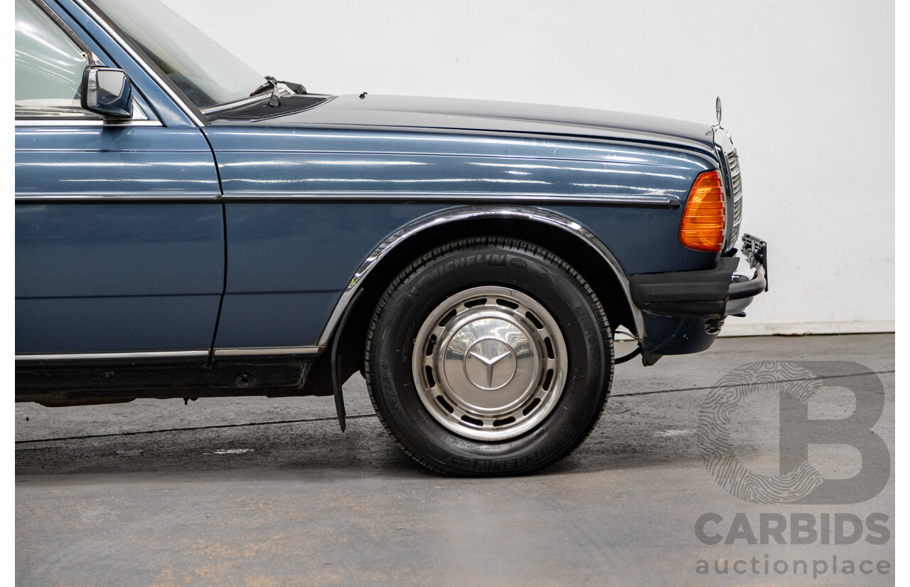 7/1984 Mercedes Benz 230 E W123 4d Sedan Blue 2.3L