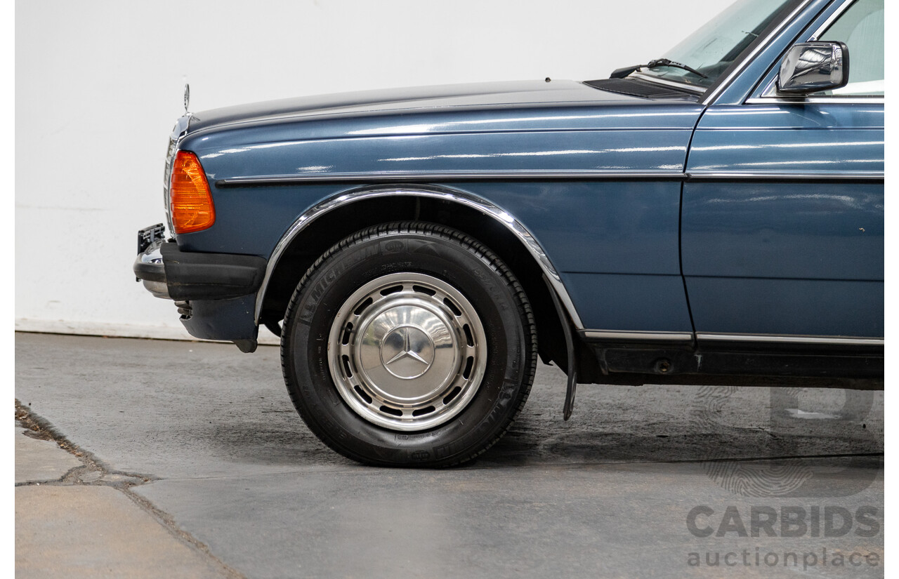 7/1984 Mercedes Benz 230 E W123 4d Sedan Blue 2.3L