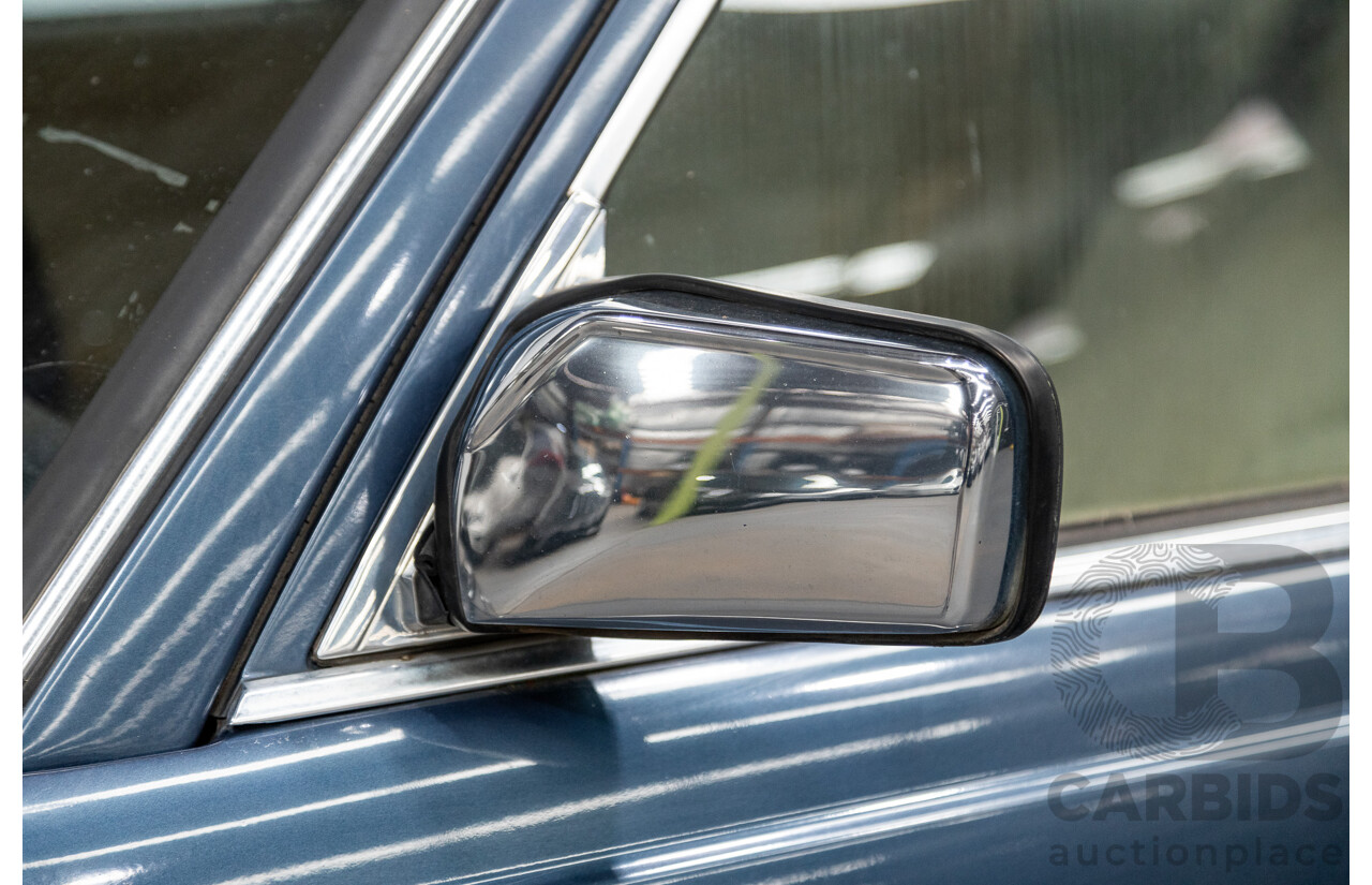 7/1984 Mercedes Benz 230 E W123 4d Sedan Blue 2.3L