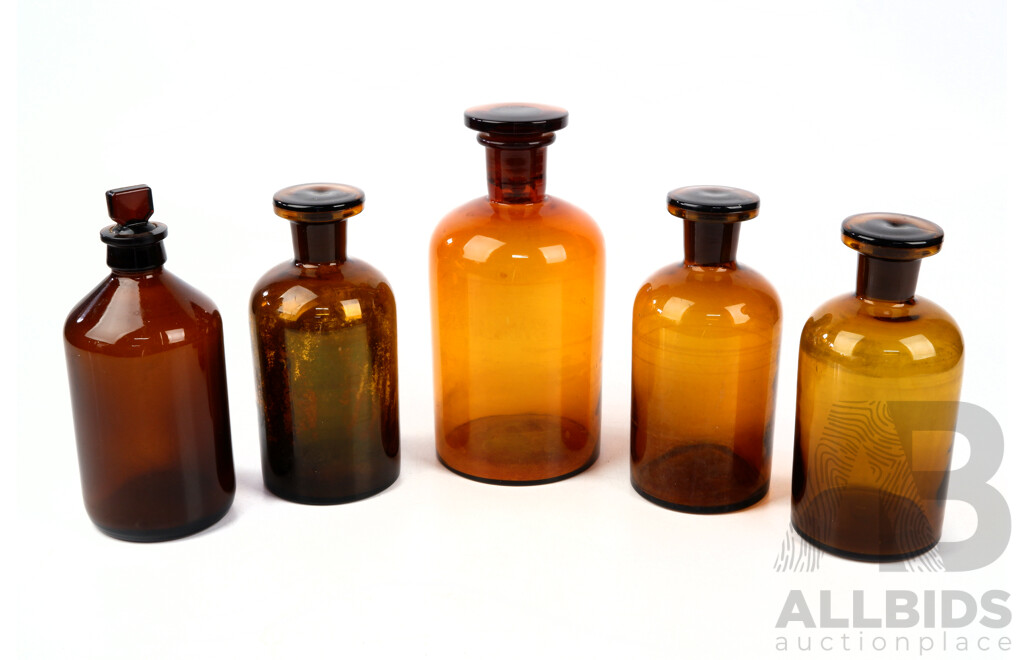 Collection Five Amber Scientific Glass Bottles with Stoppers