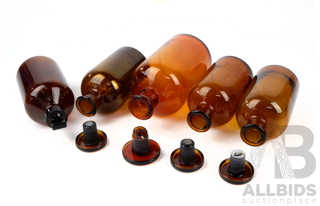 Collection Five Amber Scientific Glass Bottles with Stoppers