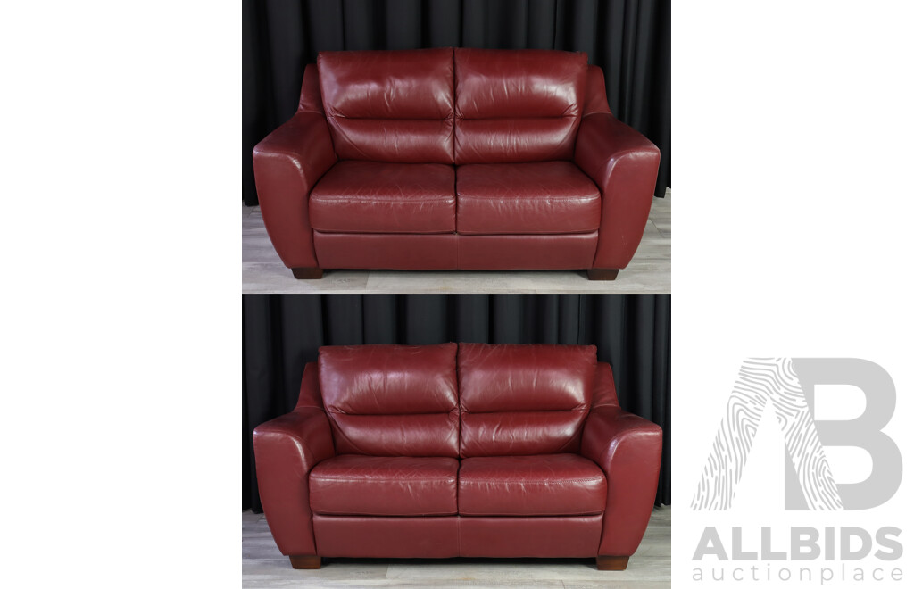 Pair of Red Leather Two Seater Lounges