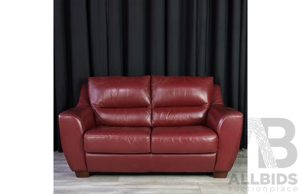 Pair of Red Leather Two Seater Lounges