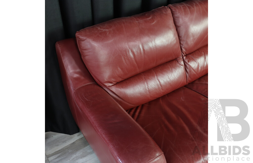 Pair of Red Leather Two Seater Lounges