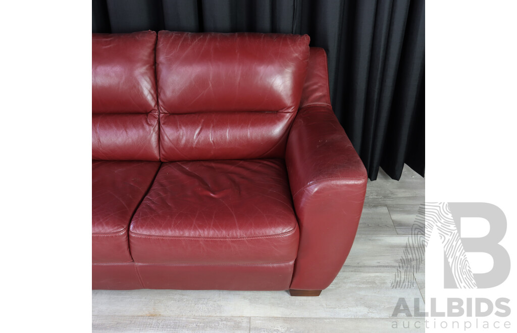 Pair of Red Leather Two Seater Lounges