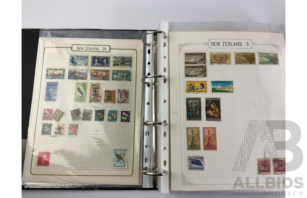 Two Albums of Mint and Cancelled Vintage Stamps Including Album of United Kingdom 1975-2020, New Zealand, Pakistan, Philippines, Russia, South Africa, Spain, USA Zambia and More