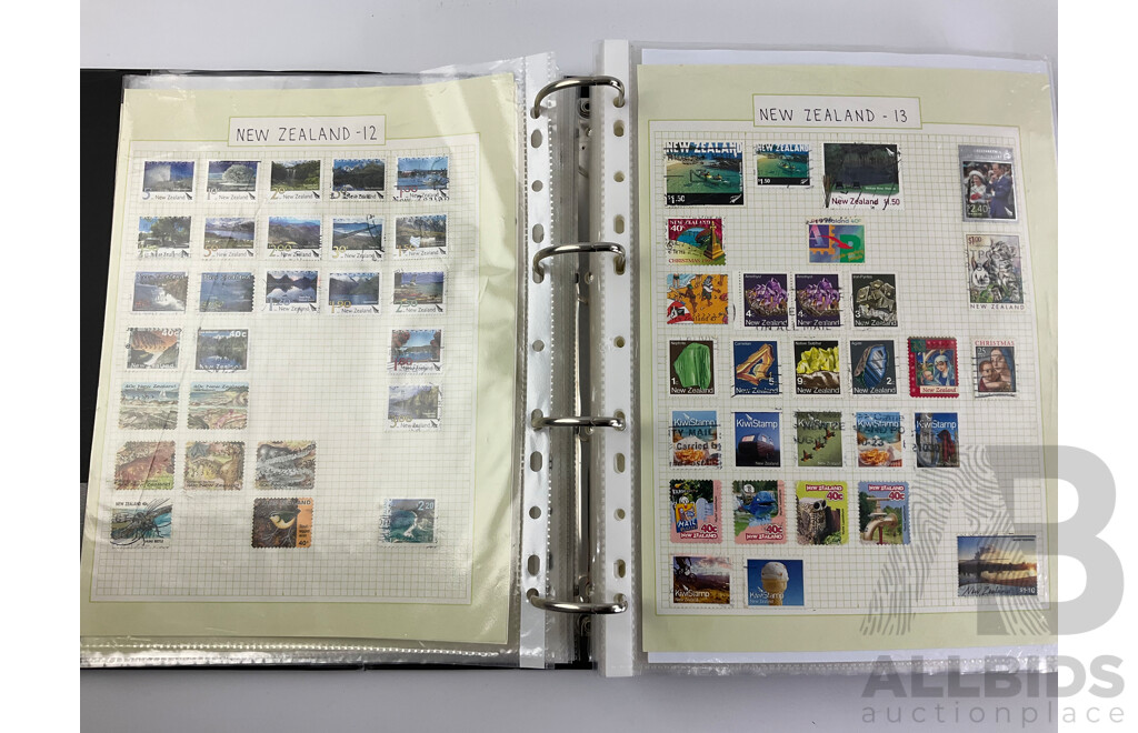 Two Albums of Mint and Cancelled Vintage Stamps Including Album of United Kingdom 1975-2020, New Zealand, Pakistan, Philippines, Russia, South Africa, Spain, USA Zambia and More