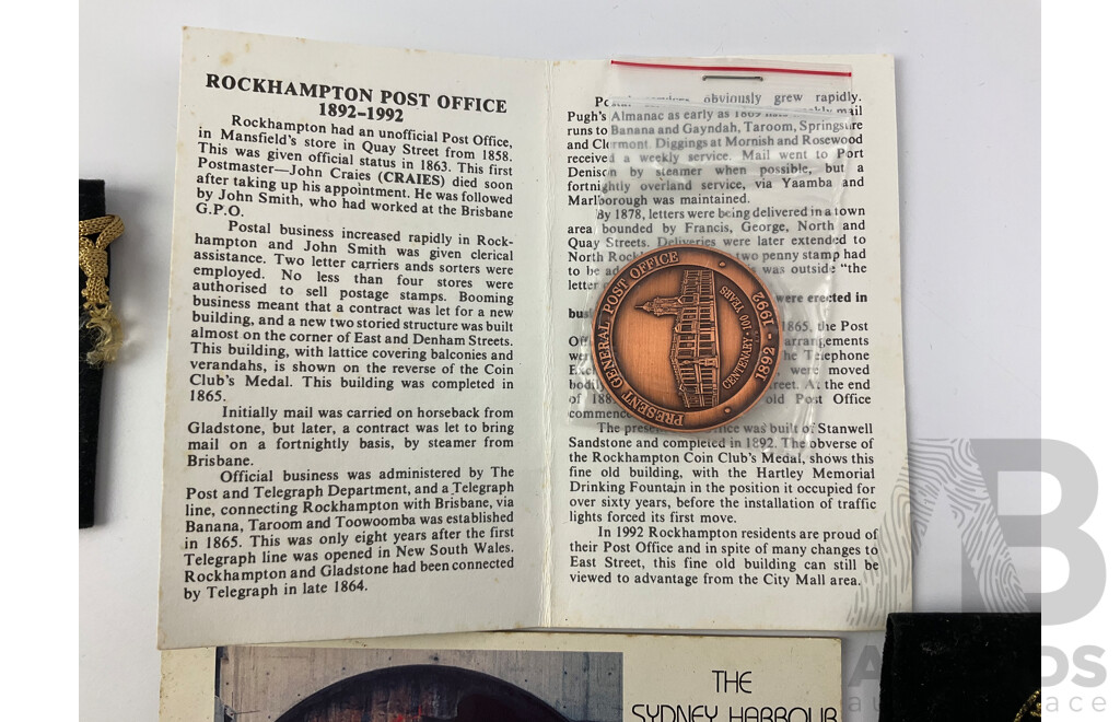 Assortment of Medallions and Coins Including Australian Late 1800's Stamp Die 'Commnwealth Disposals Commision' 1992 Harbour Tunnel and Bridge, 1970 Cook Bicentenary, 2000 Five Dollar Coin, 1985 Parliament House Sydney and More