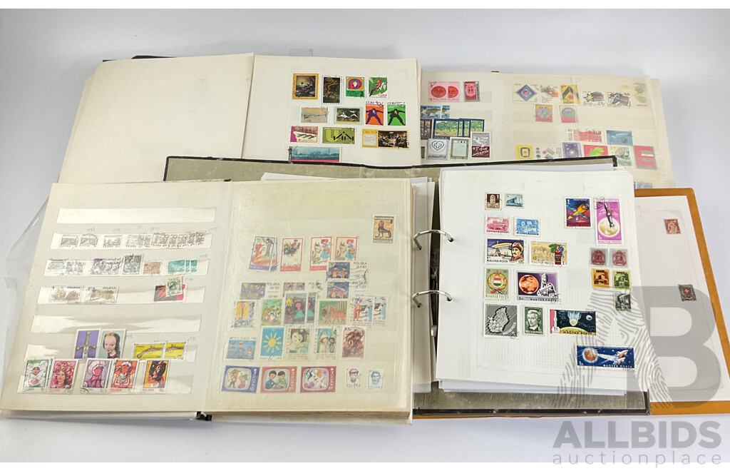 Four Albums of Vintage International Stamps Including USSR, Germany, USA, Poland, Helvetica, Spain, Japan and More