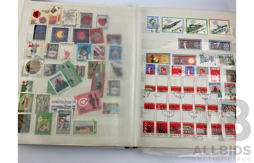 Four Albums of Vintage International Stamps Including USSR, Germany, USA, Poland, Helvetica, Spain, Japan and More