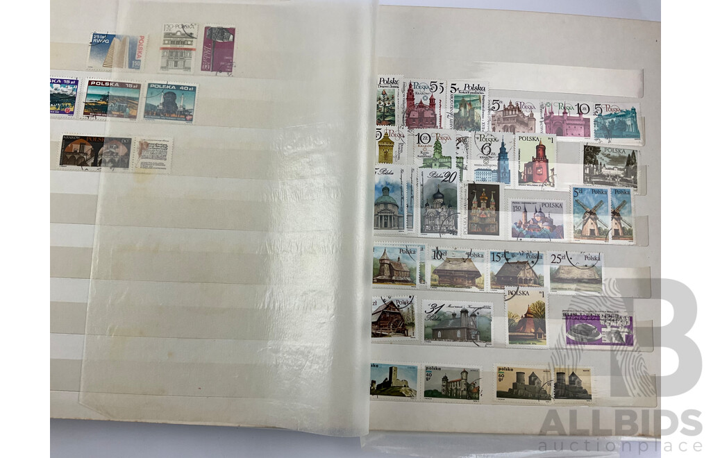 Four Albums of Vintage International Stamps Including USSR, Germany, USA, Poland, Helvetica, Spain, Japan and More