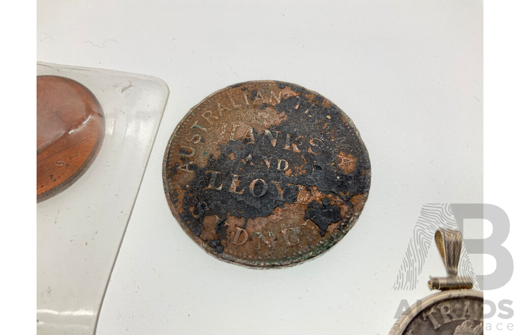 Collection of Collectible Coins Including Australian 1857 Hanks and Lloyd Tea Makers Token, 1998 Bicentennial of Flinders and Bass Voyage, 1808 East India Company Ship Wreck Coin, USA 1986 Trade Silver Pendant
