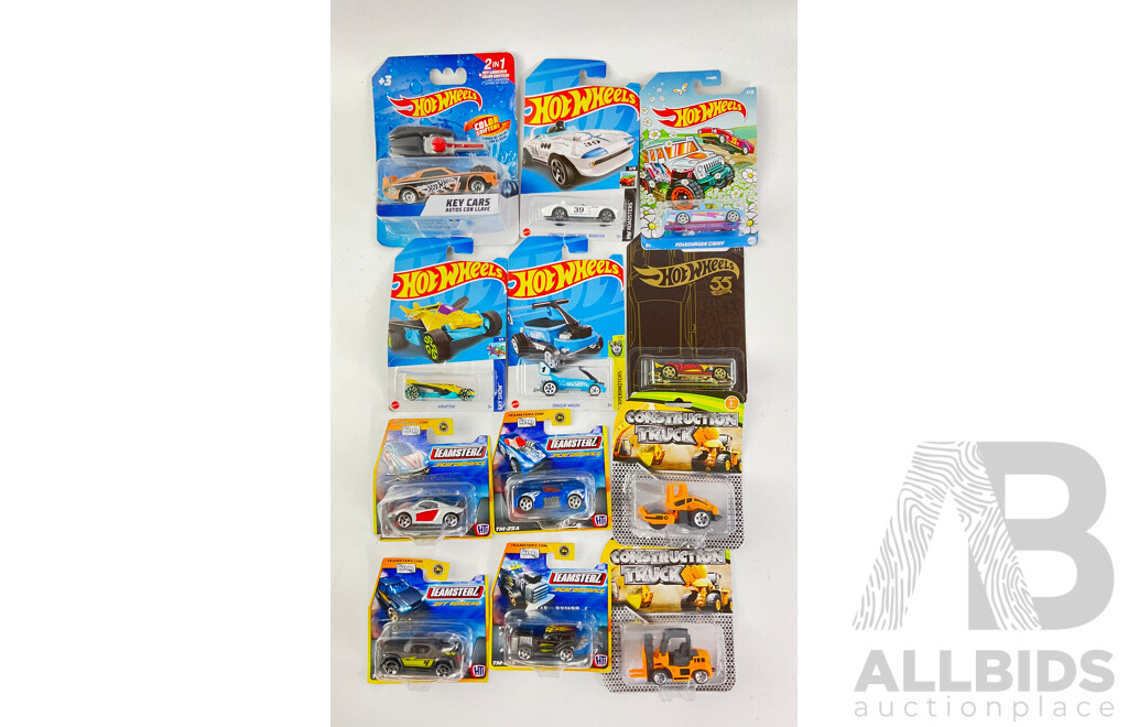 Collection of Boxed Diecast Hot Wheels Including Volkswagen Caddy, Airuption, Draggin Wagon, Dodge Challenger SRT with Construction Trucks and Teamsters