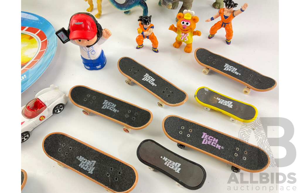 Collection of Display Dinosaurs, Speed Racer and Dragonball Z Characters with Tech Deck Skateboards