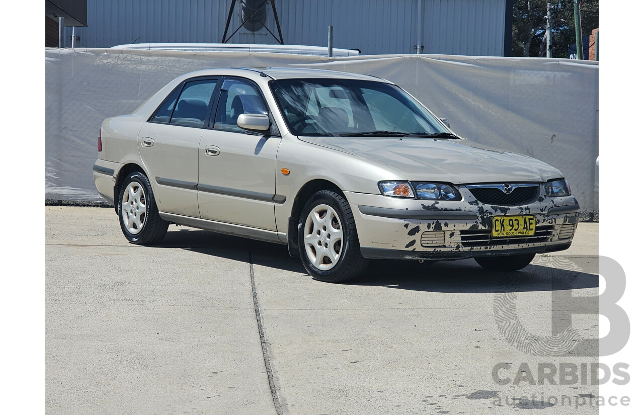 4/1999 Mazda 626 40th Anniversary  4d Sedan Silver 2.0L