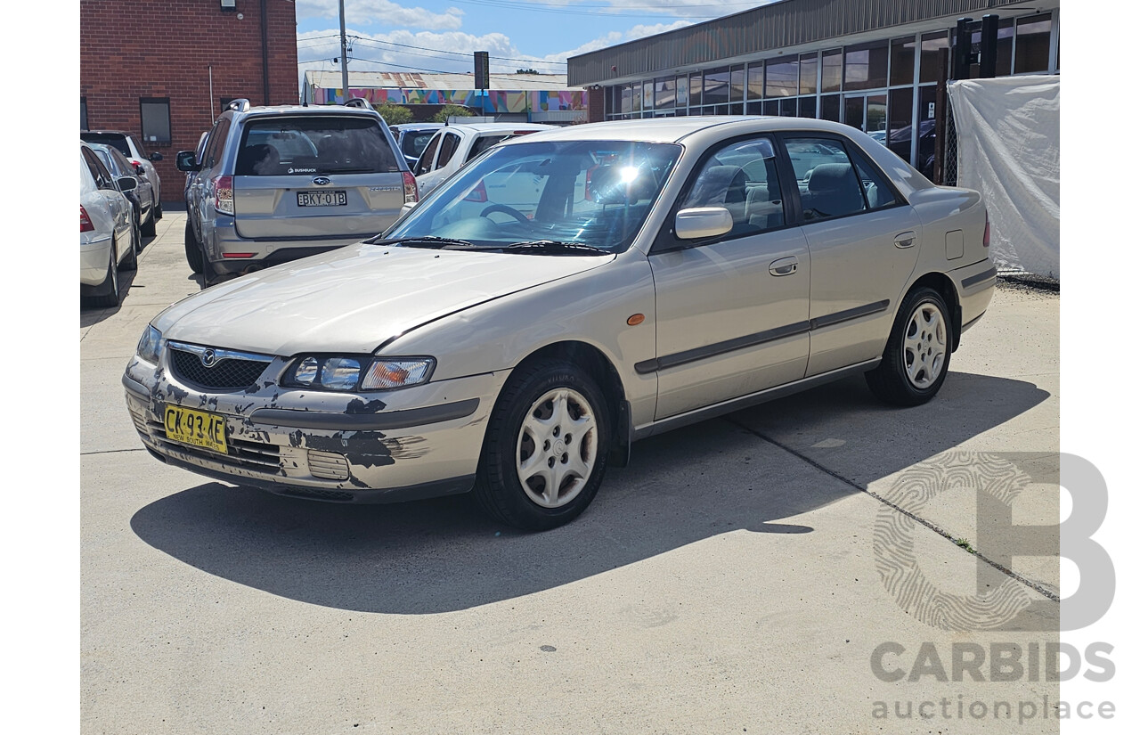 4/1999 Mazda 626 40th Anniversary  4d Sedan Silver 2.0L