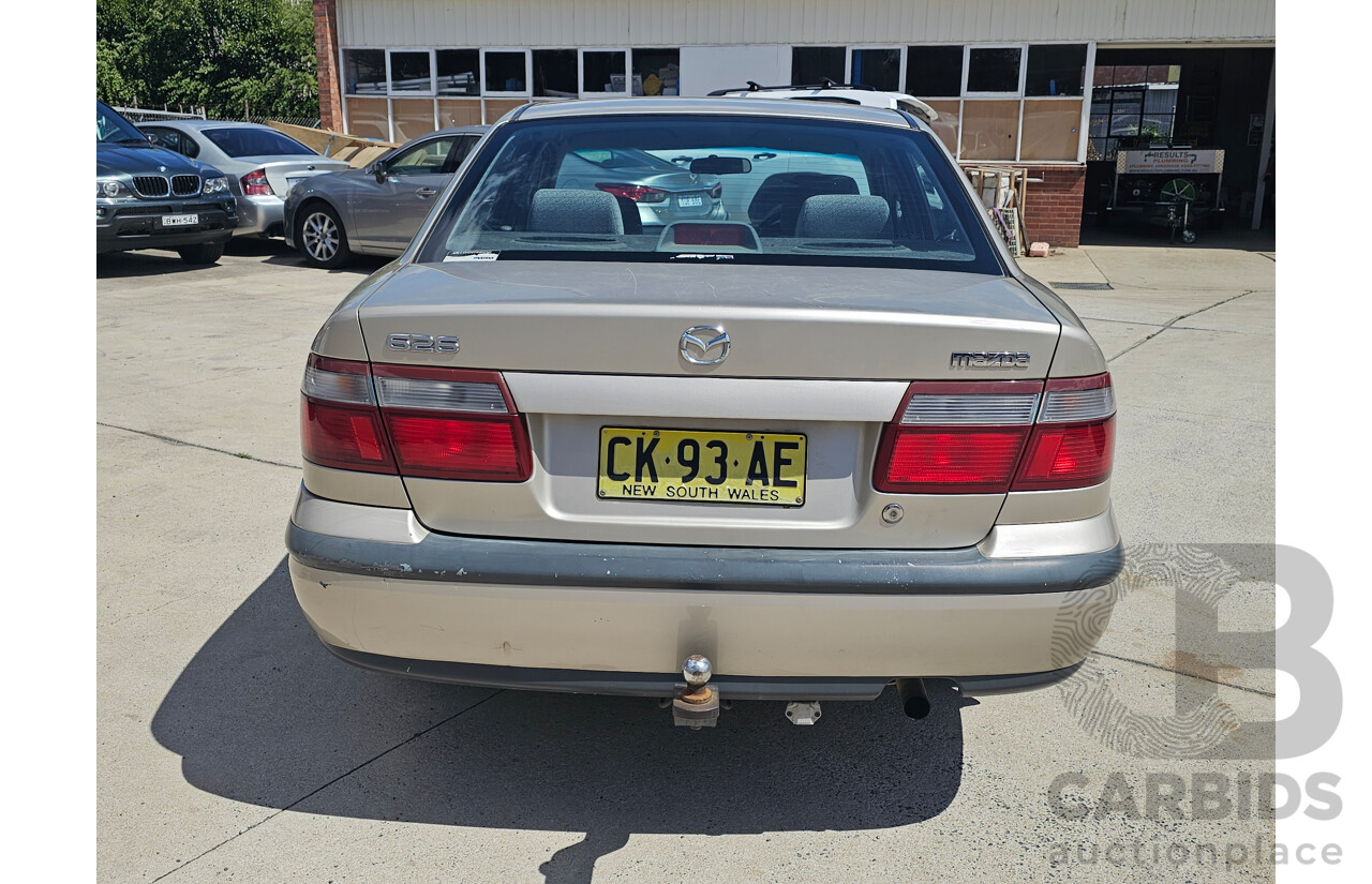 4/1999 Mazda 626 40th Anniversary  4d Sedan Silver 2.0L