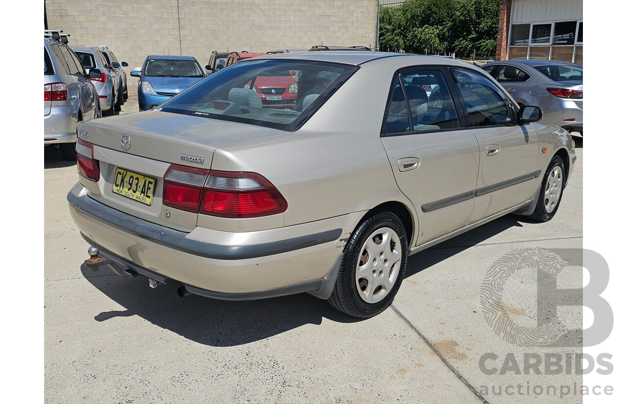 4/1999 Mazda 626 40th Anniversary  4d Sedan Silver 2.0L