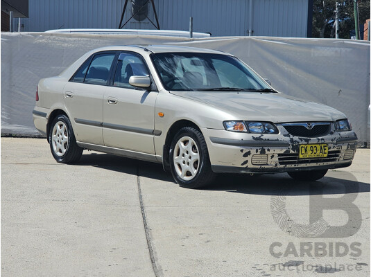 4/1999 Mazda 626 40th Anniversary  4d Sedan Silver 2.0L