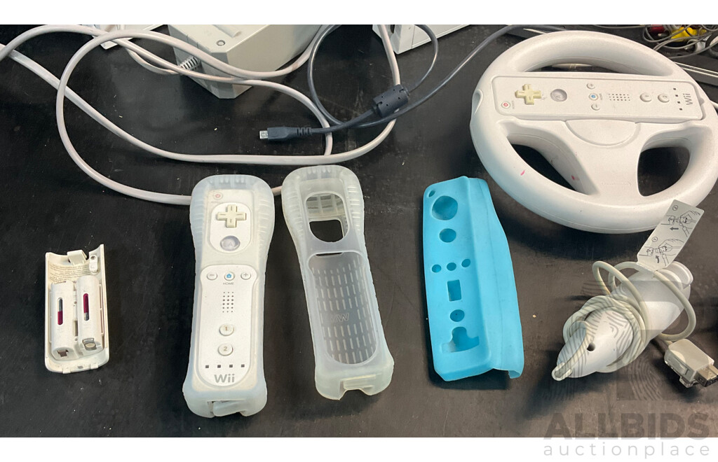 Wii Consoles (x2), Games (x5), Controllers (x3), Nunchucks (x4) & Playstation 4 Games (x2)