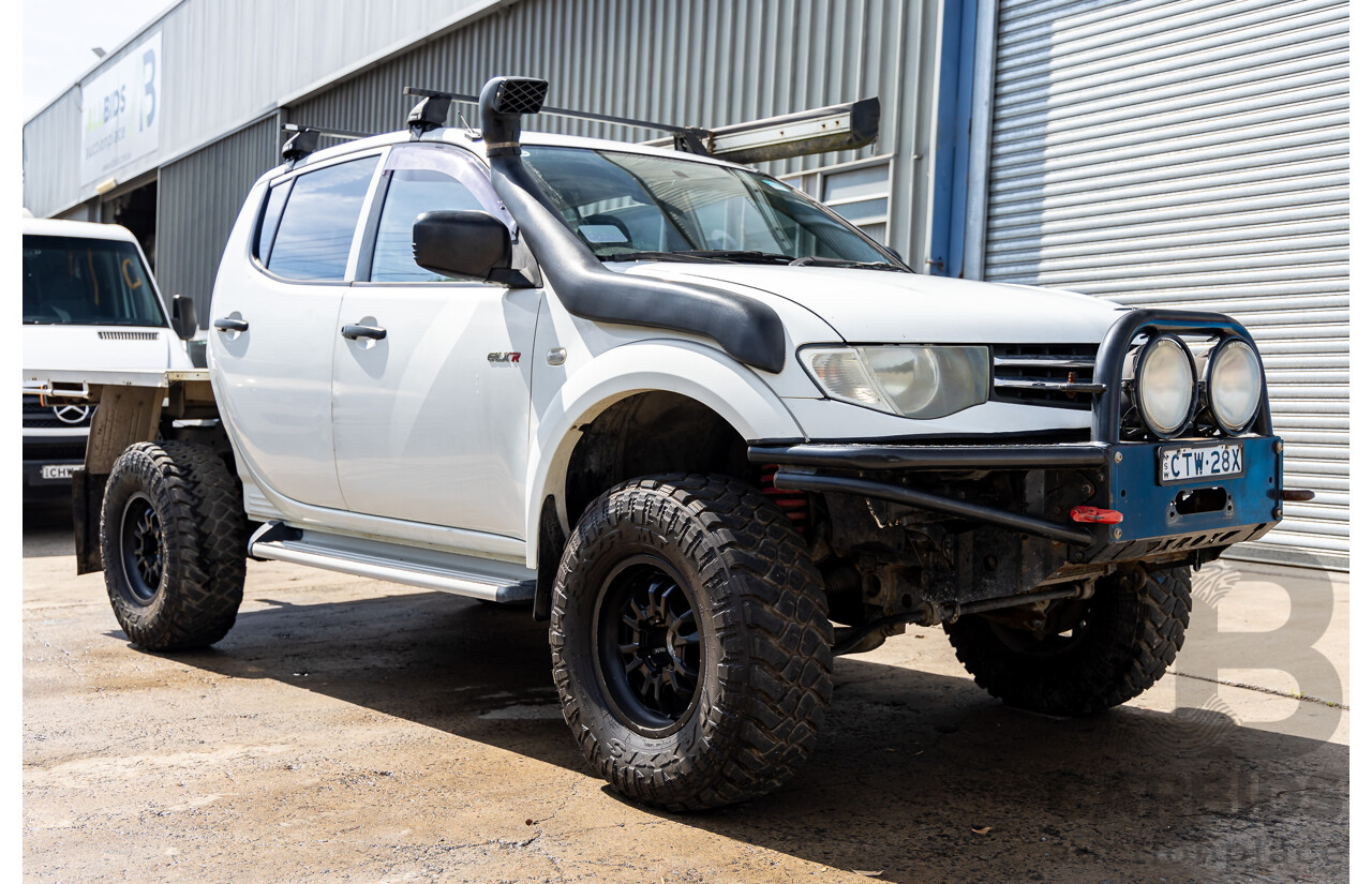 1/2014 Mitsubishi Triton GLX (4x4) MN MY15 Dual Cab Utility Solid White Turbo Diesel 2.5L