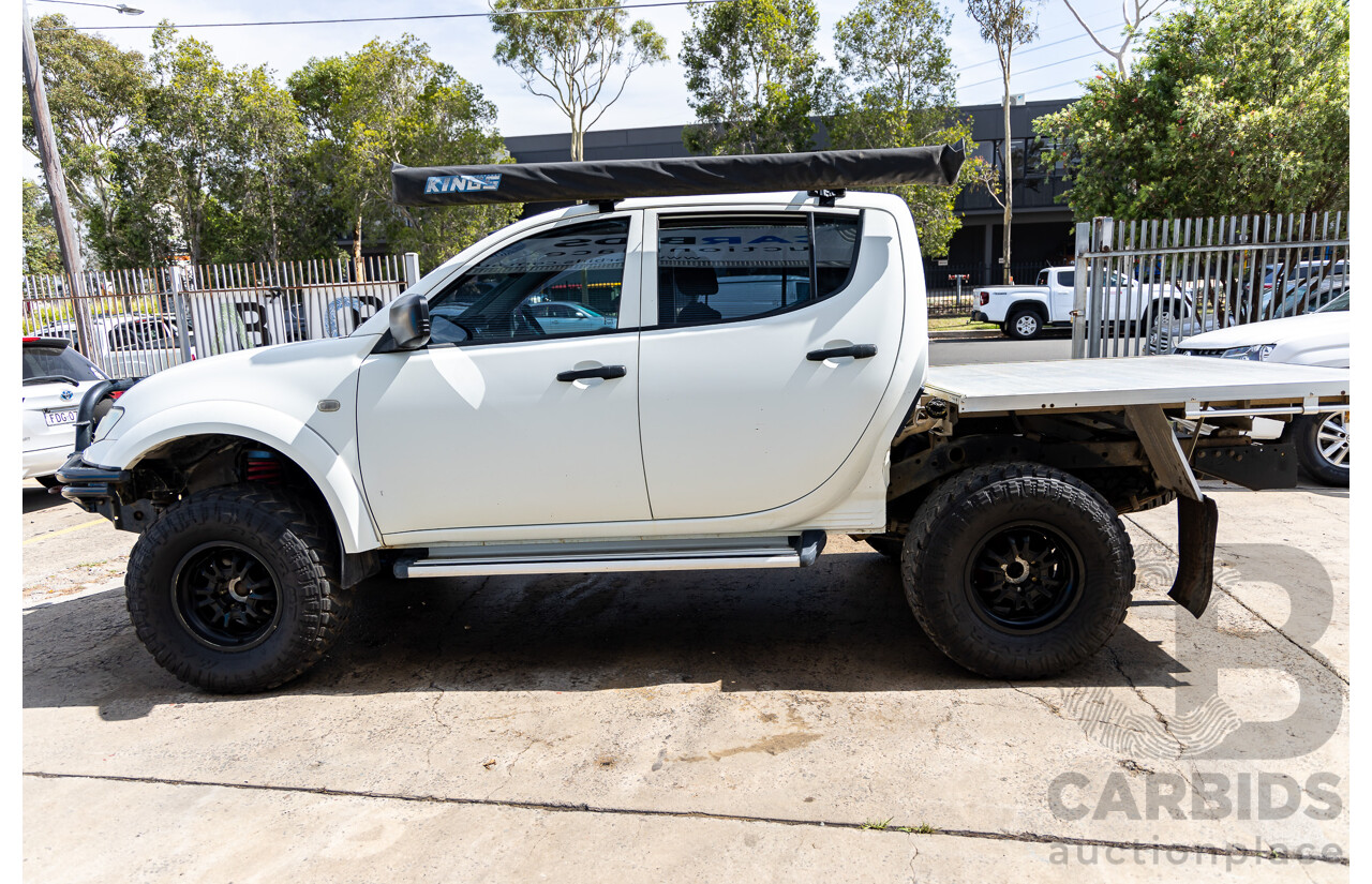 1/2014 Mitsubishi Triton GLX (4x4) MN MY15 Dual Cab Utility Solid White Turbo Diesel 2.5L