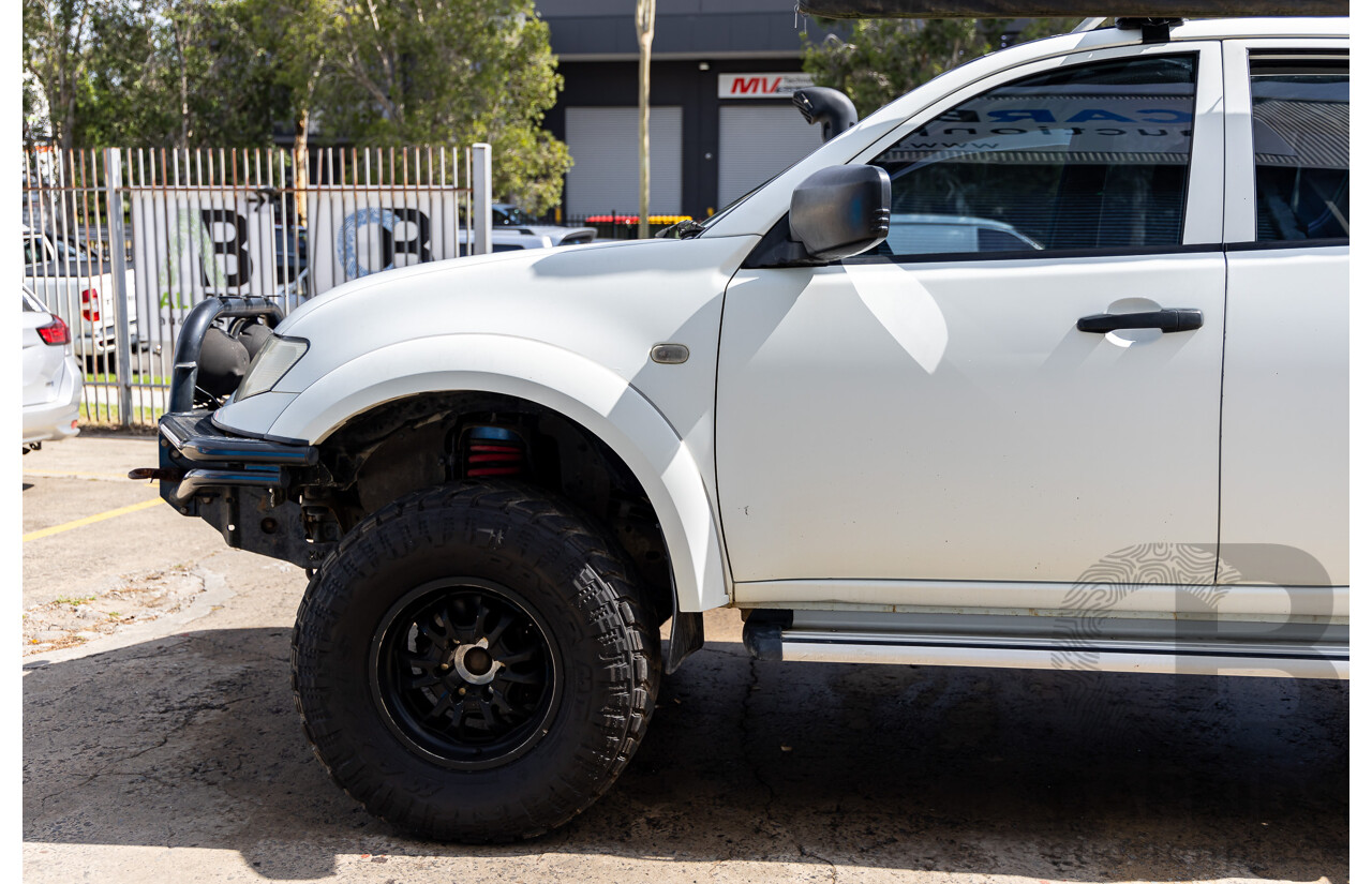 1/2014 Mitsubishi Triton GLX (4x4) MN MY15 Dual Cab Utility Solid White Turbo Diesel 2.5L