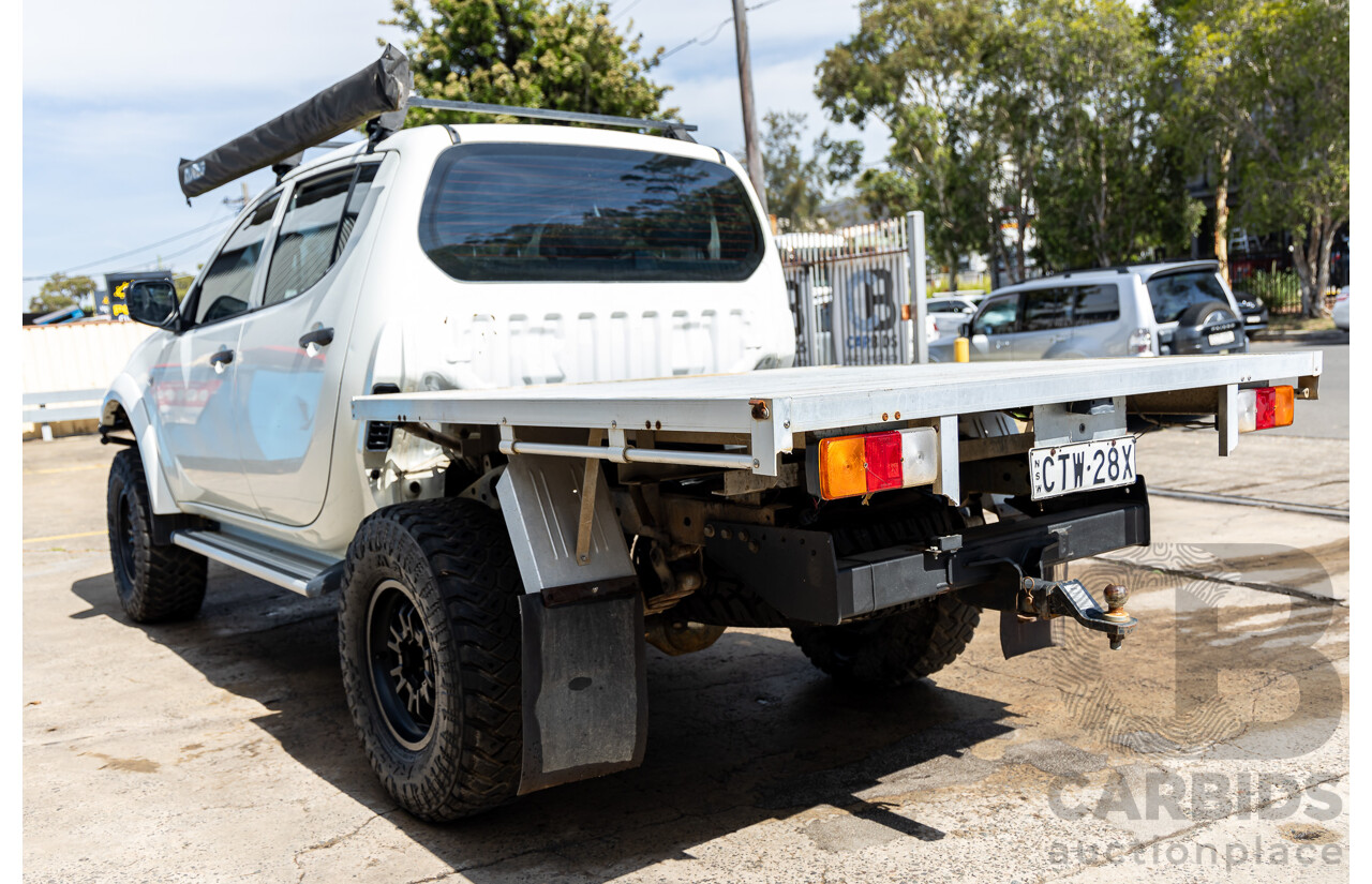 1/2014 Mitsubishi Triton GLX (4x4) MN MY15 Dual Cab Utility Solid White Turbo Diesel 2.5L