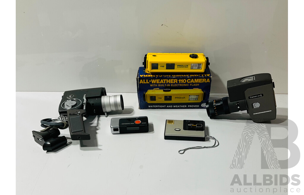 Collection of Vintage Cameras Including Canon Reflex Zoom 8-3 Handheld Film Camera, Canon Zoom 8 Film Camera, Kodak Disc 4000 Camera and More