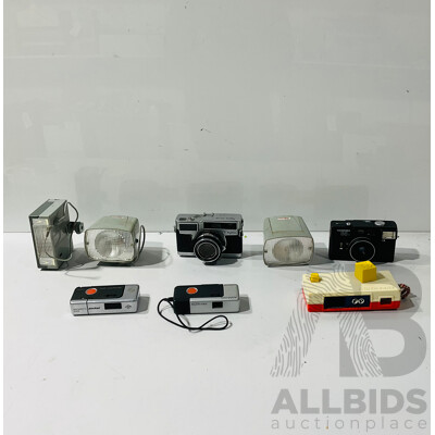 Collection of Vintage Cameras and Camera Gear Including Vujica 35-SE, Agfamatic 2008 Pocket, Kakonet Camera Flash and More