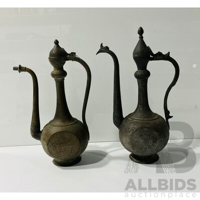 Pair of Middle Eastern Brass Pitchers with Engraved Detail