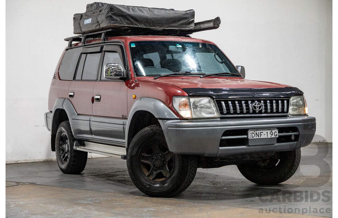 5/1998 Toyota Landcruiser Prado Grande VX (4x4) VZJ95R 4d Wagon Beaujolais Red Metallic V6 3.4L - 7 Seater