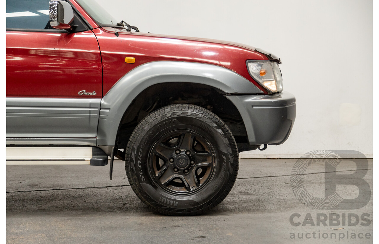 5/1998 Toyota Landcruiser Prado Grande VX (4x4) VZJ95R 4d Wagon Beaujolais Red Metallic V6 3.4L - 7 Seater