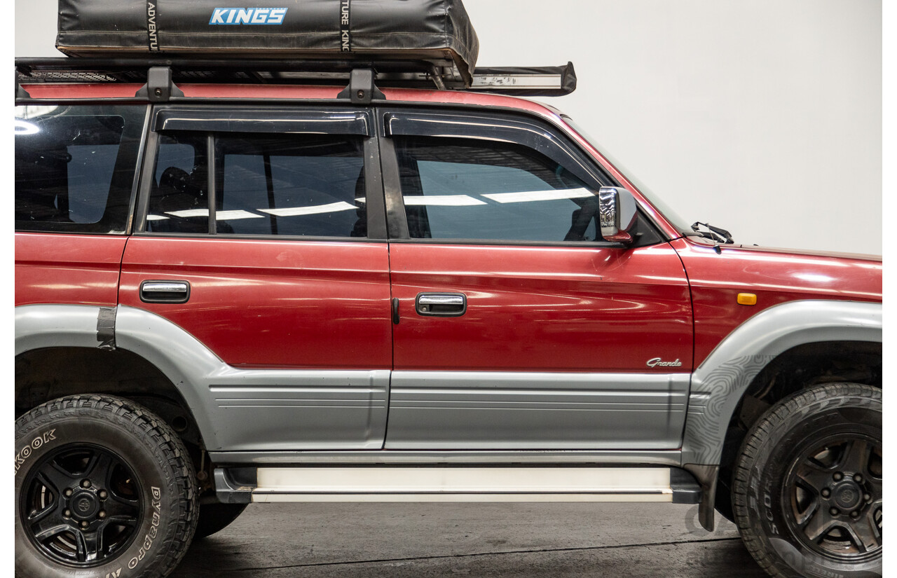 5/1998 Toyota Landcruiser Prado Grande VX (4x4) VZJ95R 4d Wagon Beaujolais Red Metallic V6 3.4L - 7 Seater