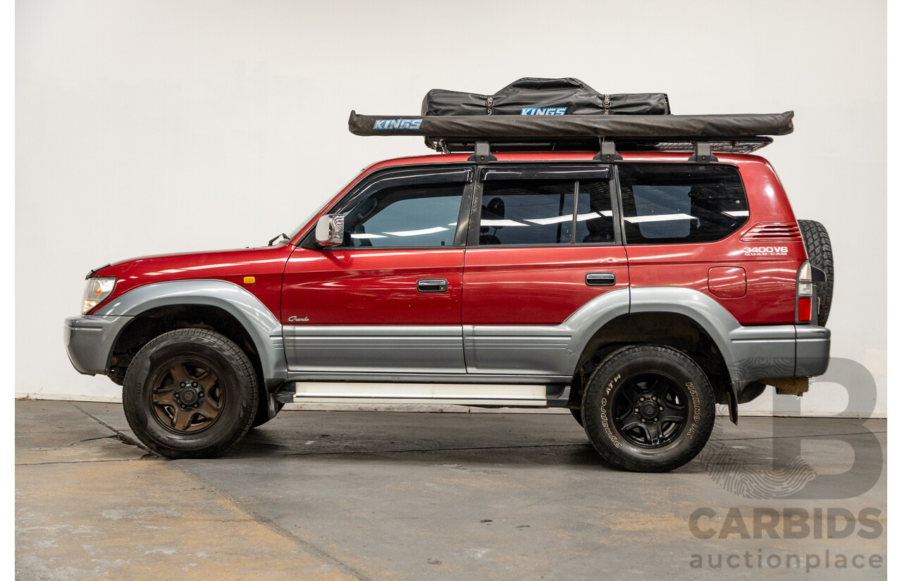 5/1998 Toyota Landcruiser Prado Grande VX (4x4) VZJ95R 4d Wagon Beaujolais Red Metallic V6 3.4L - 7 Seater