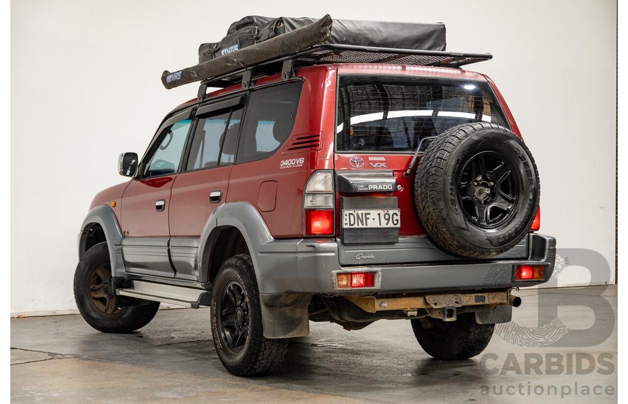 5/1998 Toyota Landcruiser Prado Grande VX (4x4) VZJ95R 4d Wagon Beaujolais Red Metallic V6 3.4L - 7 Seater