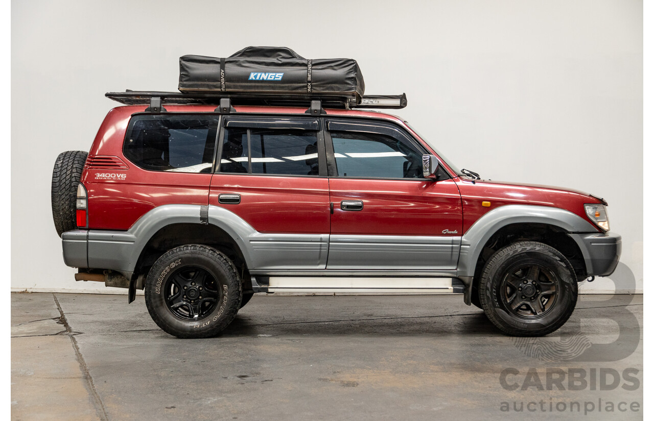 5/1998 Toyota Landcruiser Prado Grande VX (4x4) VZJ95R 4d Wagon Beaujolais Red Metallic V6 3.4L - 7 Seater