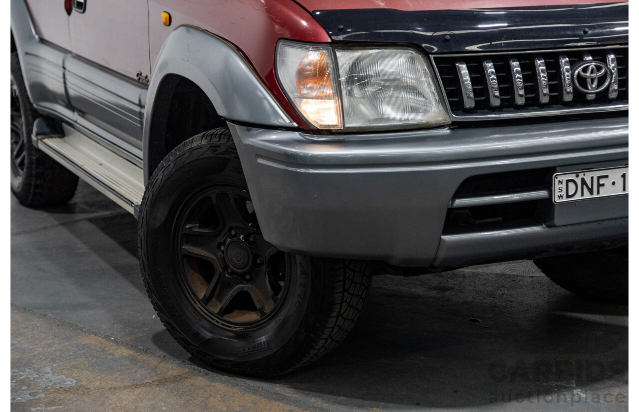 5/1998 Toyota Landcruiser Prado Grande VX (4x4) VZJ95R 4d Wagon Beaujolais Red Metallic V6 3.4L - 7 Seater