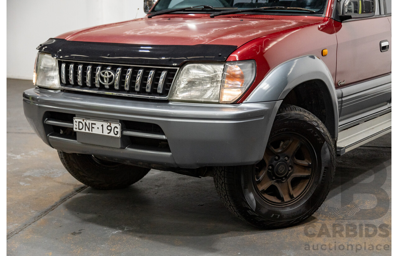 5/1998 Toyota Landcruiser Prado Grande VX (4x4) VZJ95R 4d Wagon Beaujolais Red Metallic V6 3.4L - 7 Seater