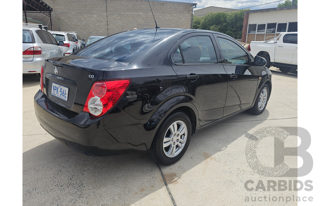 4/2013 Holden Barina CD TM MY13 4d Sedan Black 1.6L